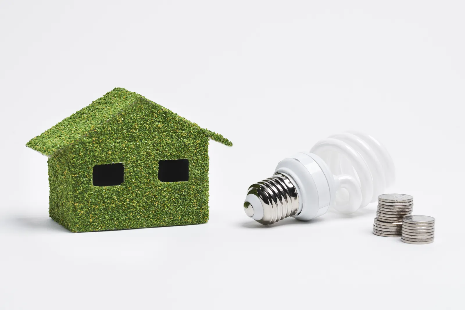 Een maquette en tekening van een energiezuinige woning